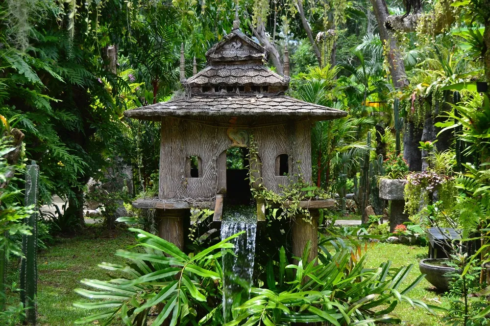 A peaceful carved shrine in the jungle — design your own route to spots like this