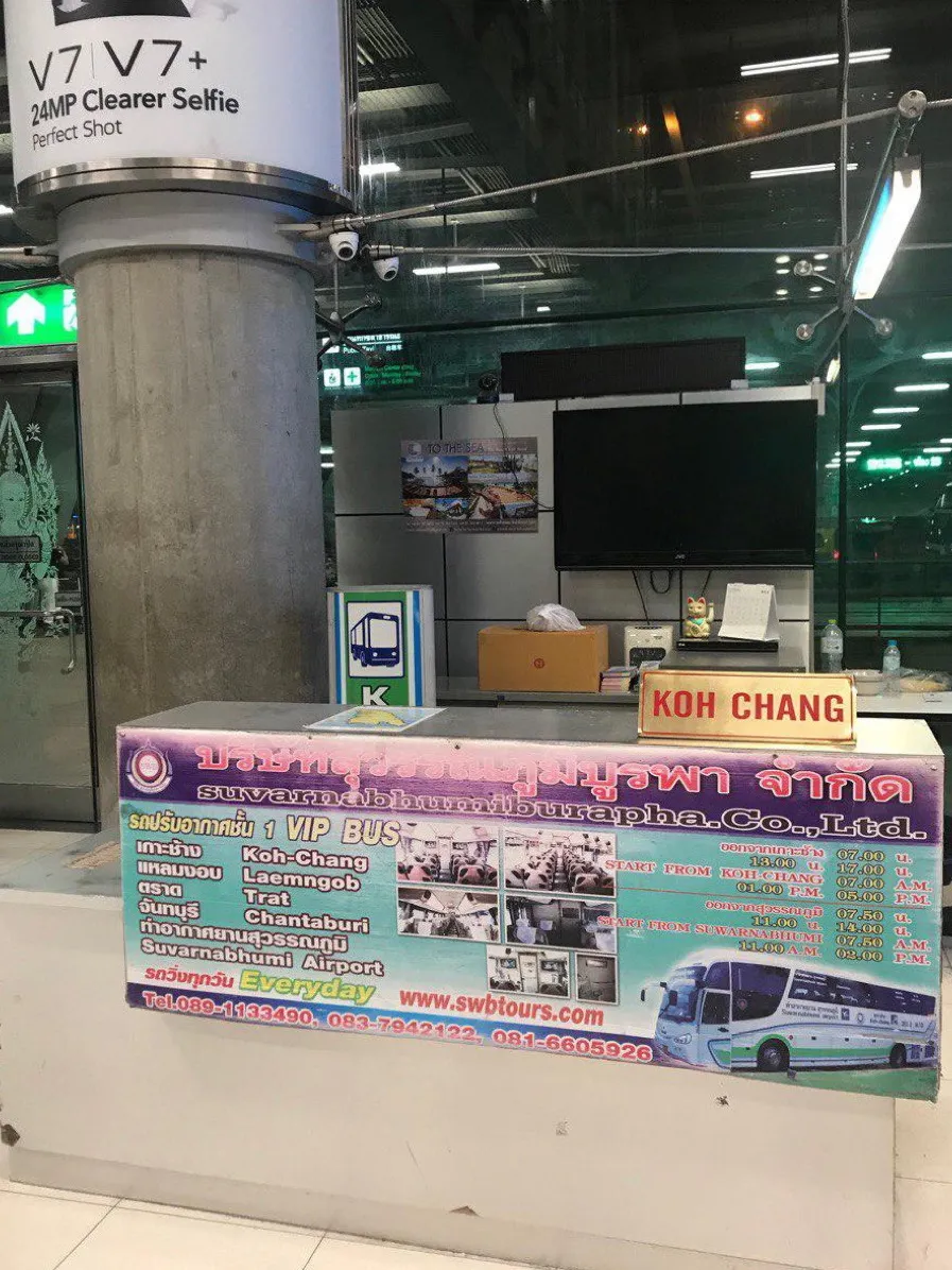 A Koh Chang minibus operator desk inside Suvarnabhumi airport